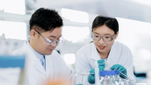 Two scientists performing laboratory tests in the laboratory environment.
