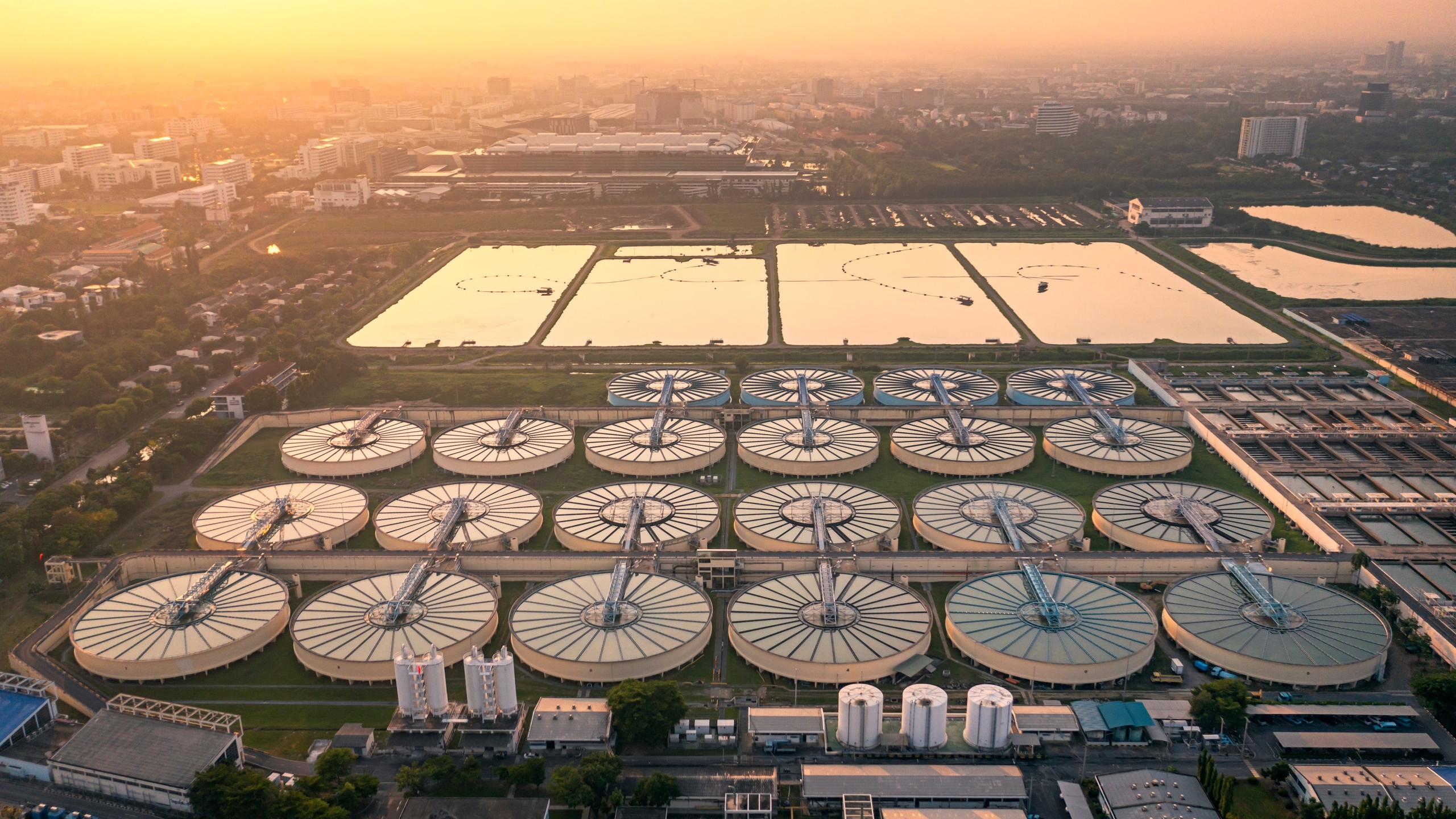Worker at wastewater treatment plant.